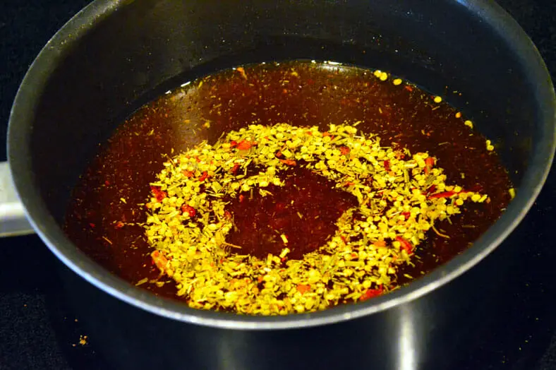 Mixing ingredients in olive oil and cooking it
