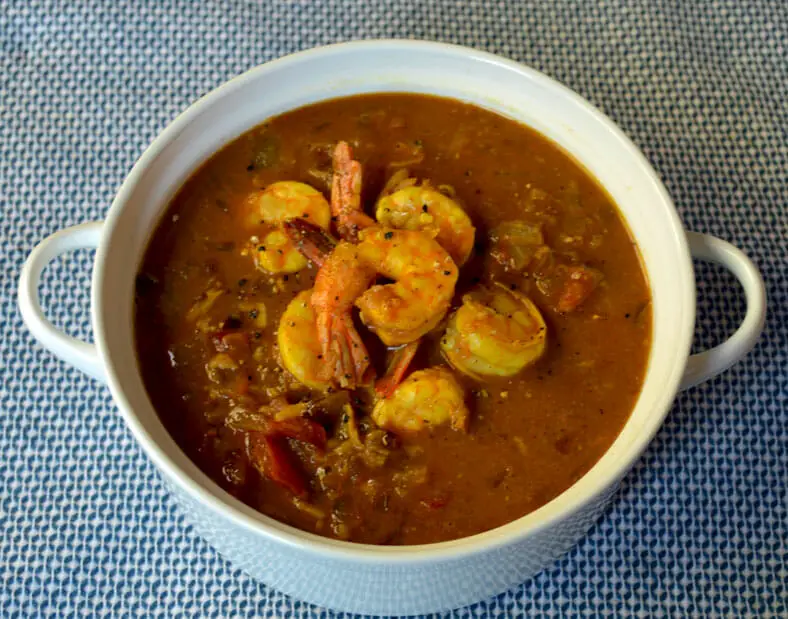 Curry with shrimps in serving bowl