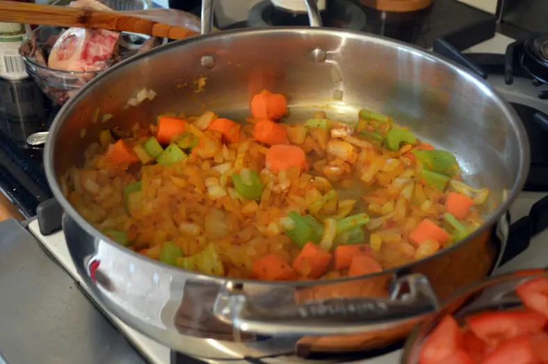 Sautéing vegetables in pan for the stew 