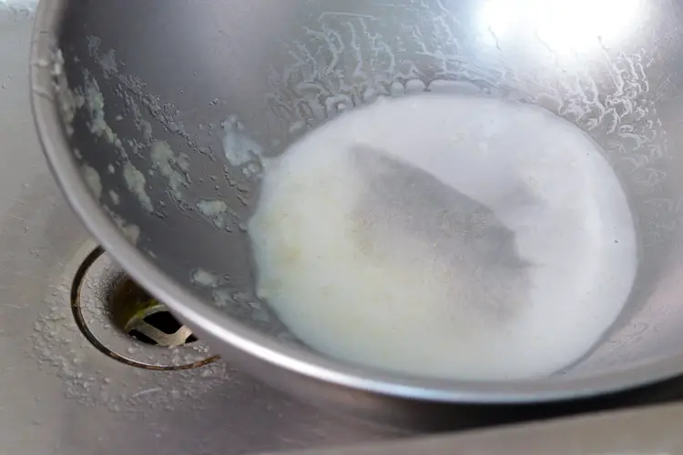 Potato starch gathered after removing excess water while grating