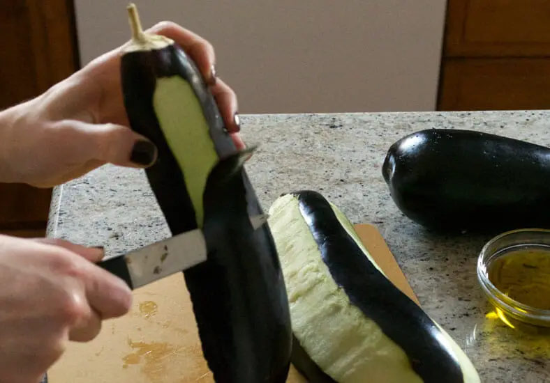 Peel eggplant in Zebra pattern using knife for proper cooking