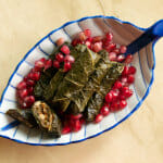 Stuffed grape leaves with pomegranate seeds
