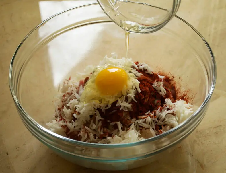 Combination of rice, ground pork, egg and a healthy amount of paprika