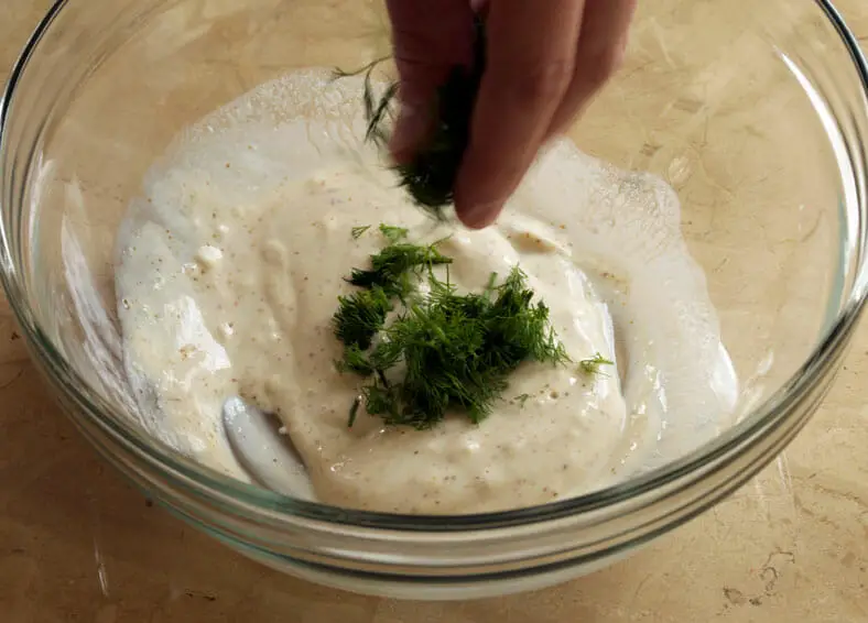 Adding dill to yogurt for dressing of salad