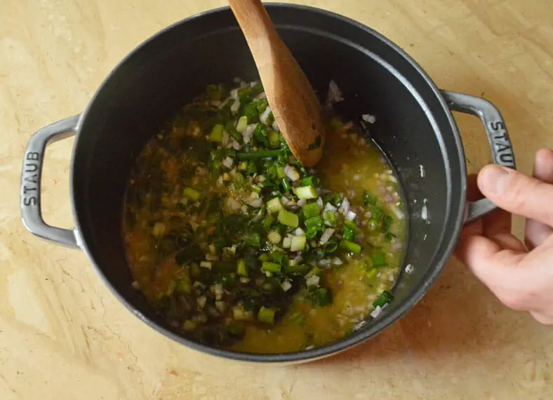 Mixing marinade in a pan with all ingredients