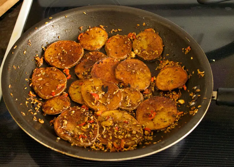 Delicious topping made with potatoes fried in red chilis and fennel seeds 