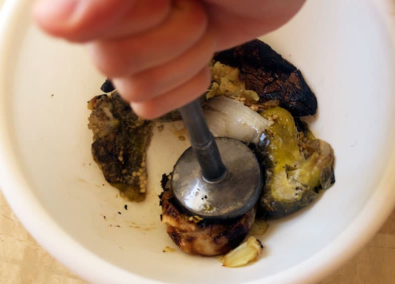 Roasted eggplant in mortar and pestle