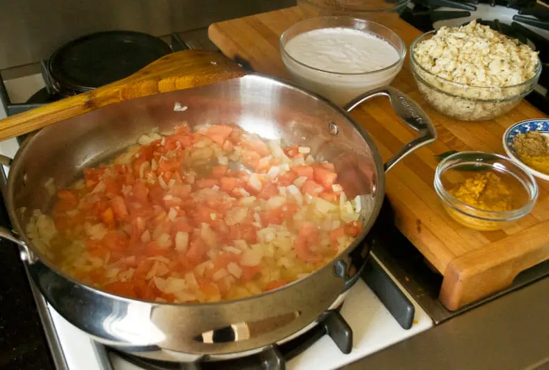 Onions and Tomatoes simmering for Mozambique Caril de Caranguejo (Crab Curry)
