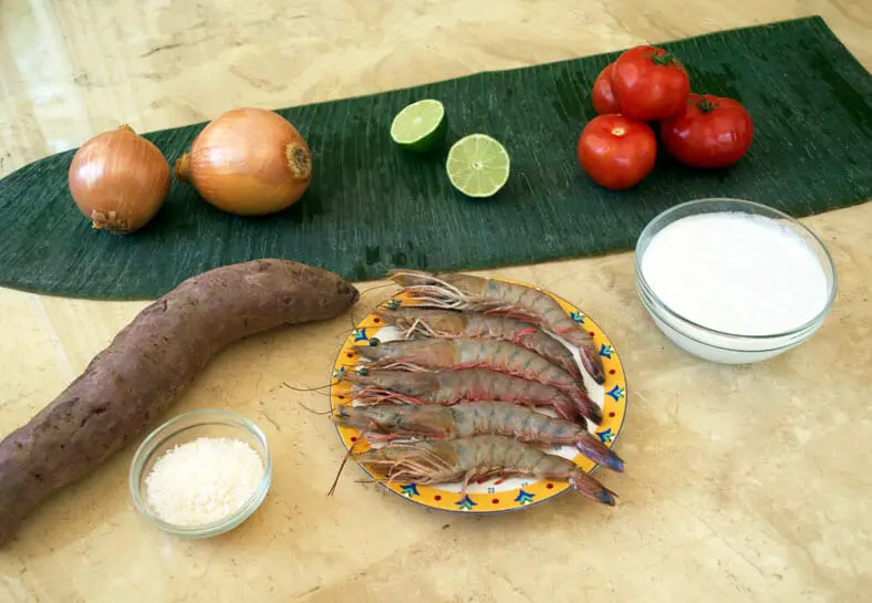Ingredients for the New Caledonian Bougna, a Kanak dish, featuring prawns and yams