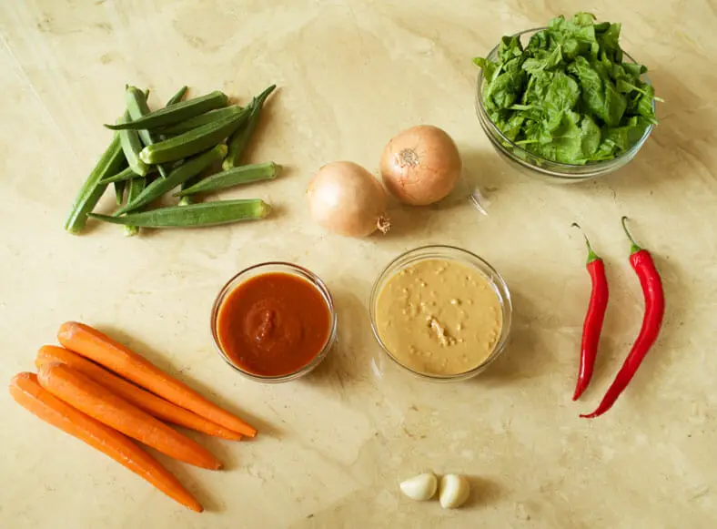 Ingredients - carrots, okra, onions, tomato sauce, chili peppers, garlic