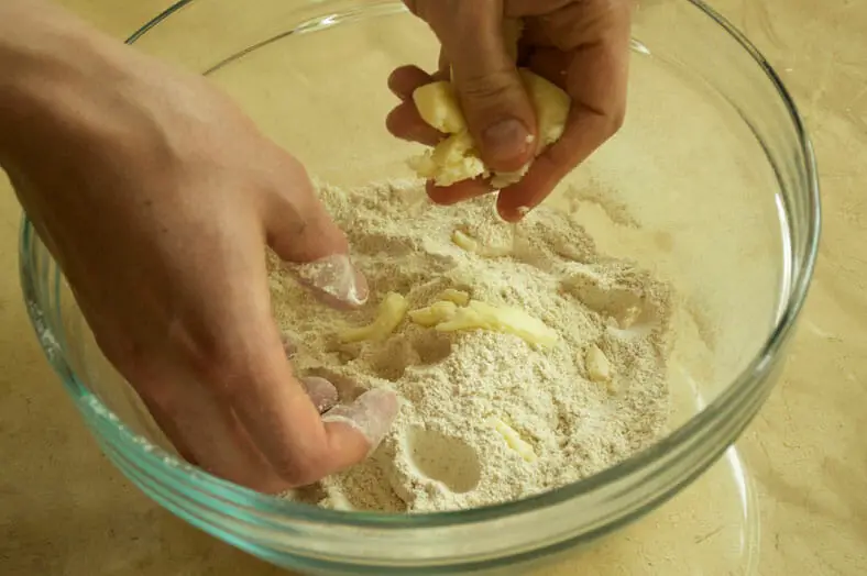 Adding butter to dough