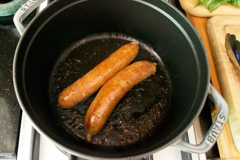 Start by dry frying your chorizo to release it's natural oils and flavors to season the pan