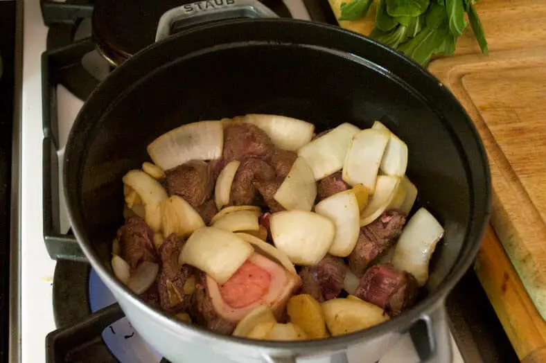 Cook beef and onions, garlic, ginger mixture