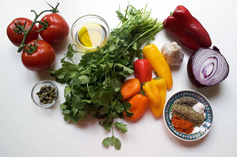 Ingredients of Sofrito - onion, cilantro, bell peppers and various spices