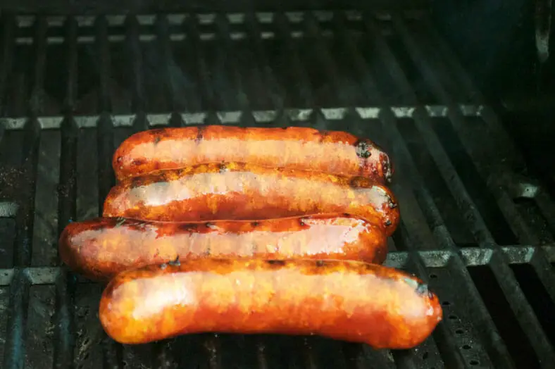 After you make chimichurri for the Argentine Choripan, heat up the grill and once hot throw on the chorizo for a few minutes, while being mindful of rotating the sausages so they cook evenly