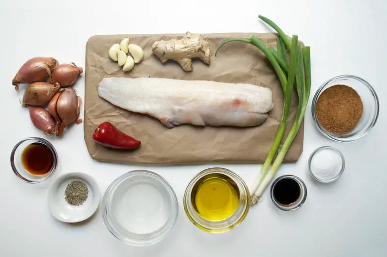 Ingredients needed to make this spectacular dish - fish, green onions, shallots, chili, garlic, ginger, oil, lemon juice