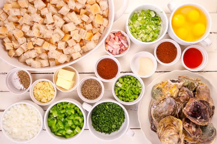 Ingredients to prepare the famous oyster cajun dish for thanksgiving - beef, oysters, eggs, bell peppers, spices, paprika, butter, thyme, scallions