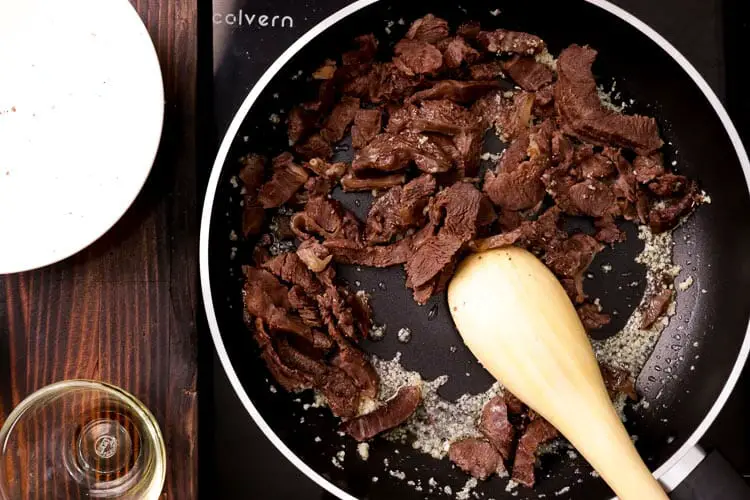 Cook carved beef with salt, pepper into olive oil