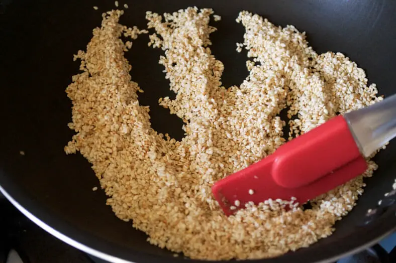 Sautéing sesame seeds in pan