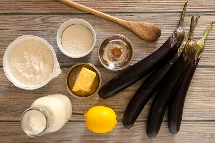 Ingredients for eggplant puree - butter, eggplant, lemon, flour, milk