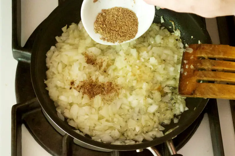 Frying onions to add in lamb mixture