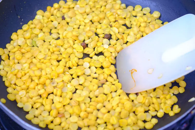 Sautéing chana dal with tablespoon of saffron water
