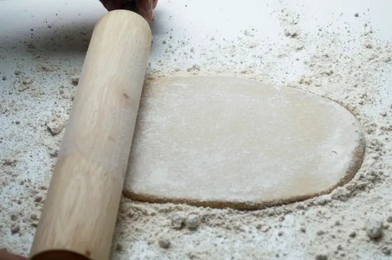 Rolling dough into oval shape