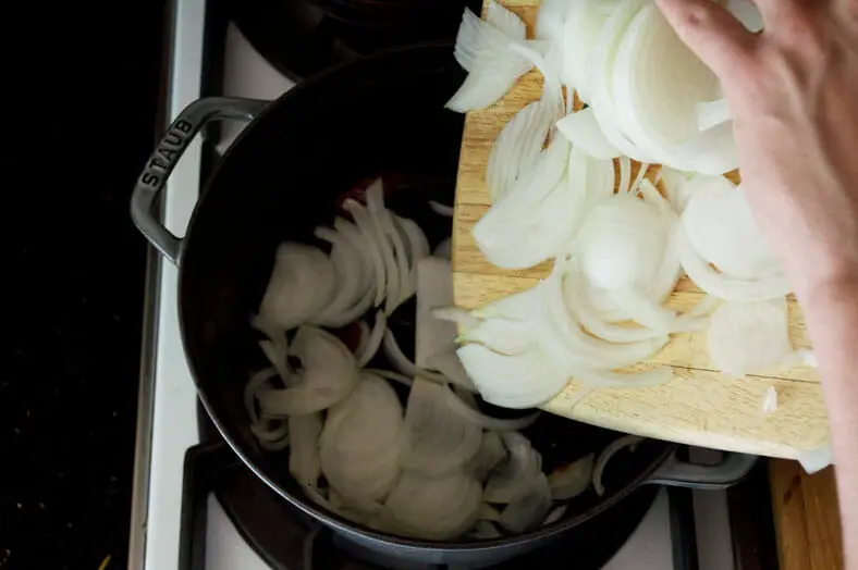 Frying onions until golden brown in po