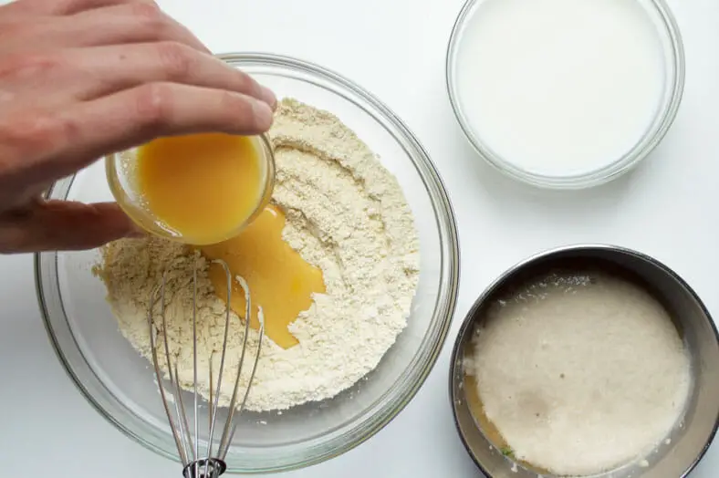 Mixing flour with eggs