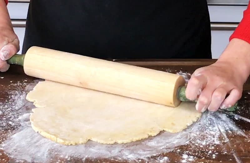 Rolling bottom crust with rolling pin
