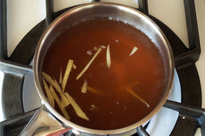 Boiling ginger and sugar syrup for cooking