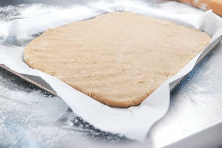 evenly lay the dough on baking paper