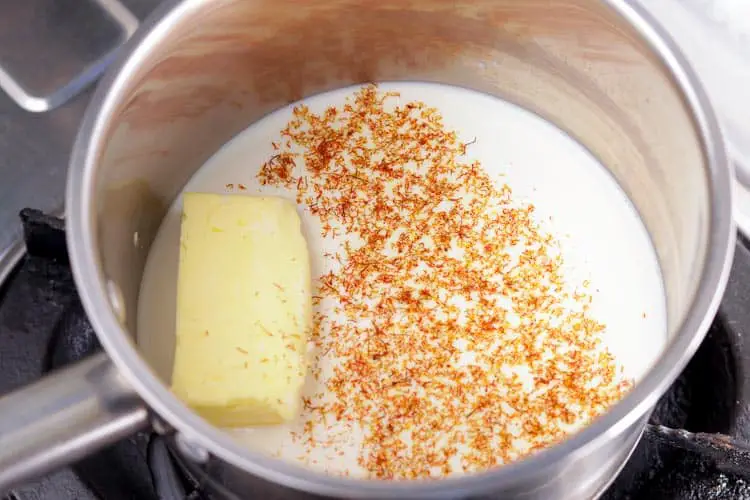 Butter, milk and saffron heating in a pan