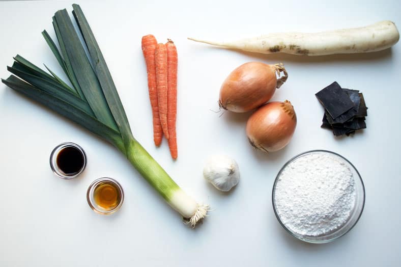 View of ingredients - onions, carrots clove, radish
