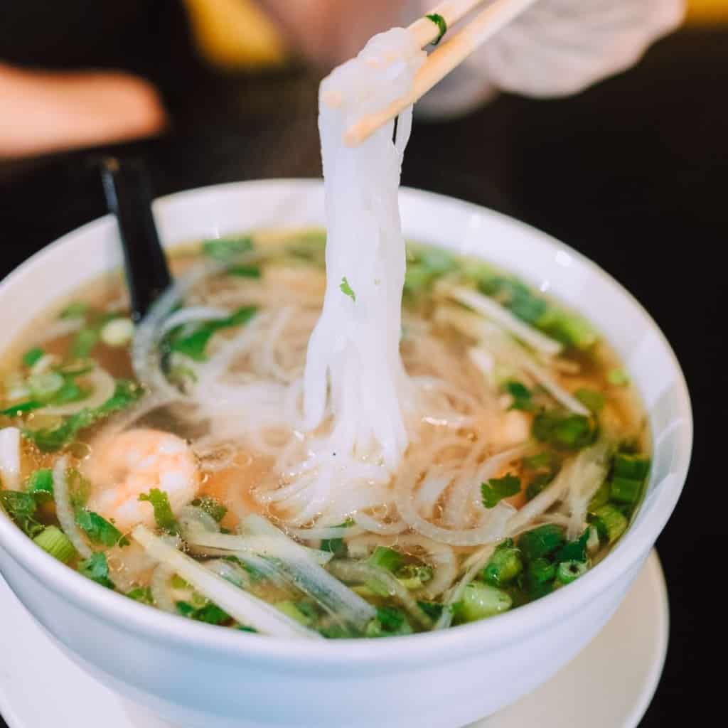 bowl of healthy pho noodle soup with rice noodle
