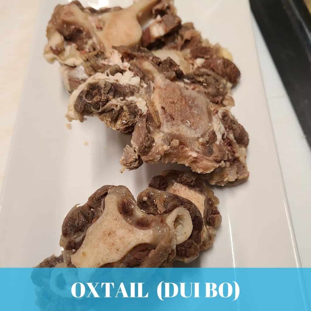 oxtail, cross section, sliced and cooked for serving with pho