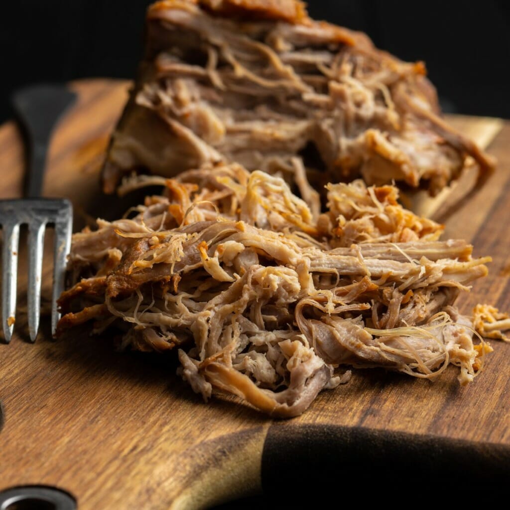 meat that is pulled apart tender with two forks