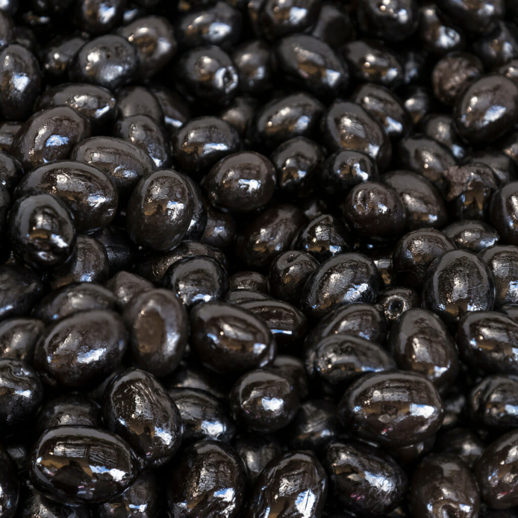 lots of shiny black olives
