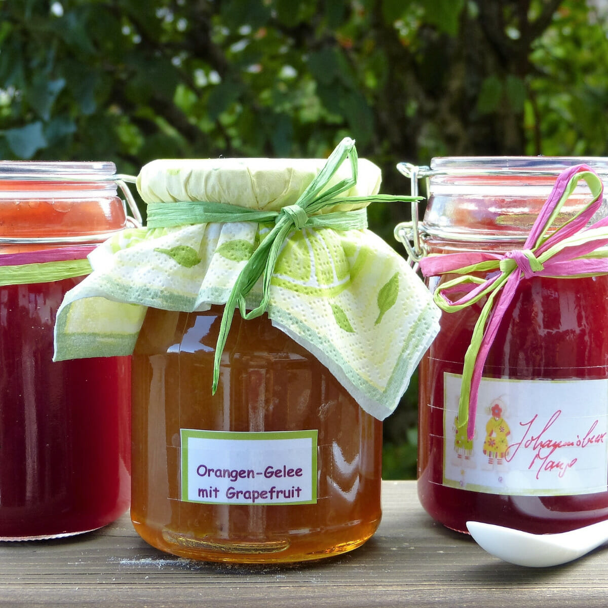decorative labeled jars containing jams
