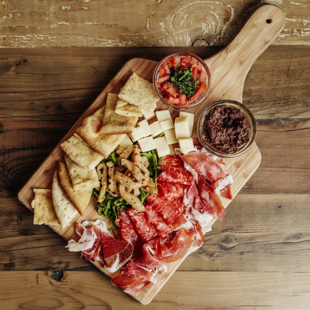best board for charcuterie - best shape is ones with a handle for small party this one is rectangular with a handle