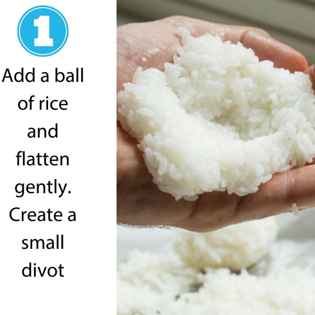 rice ball flattened out on the palm of hand - how to make onigiri by hand with no mold step 1