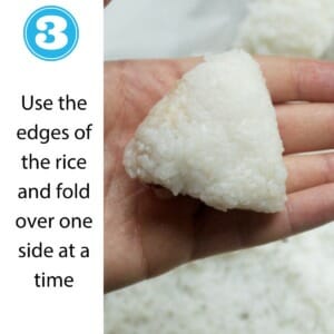 rice in palm of hand in triangle shape