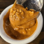 spoon up close showing peanut dipping sauce