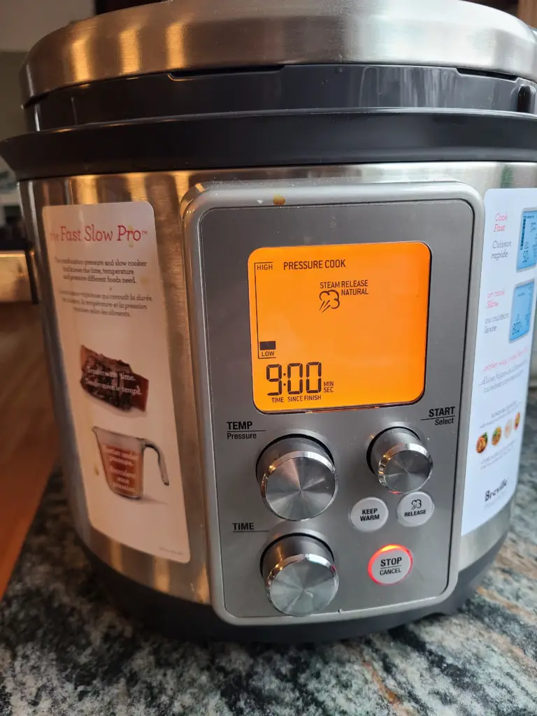 an instant pot set to the pressure cooker setting