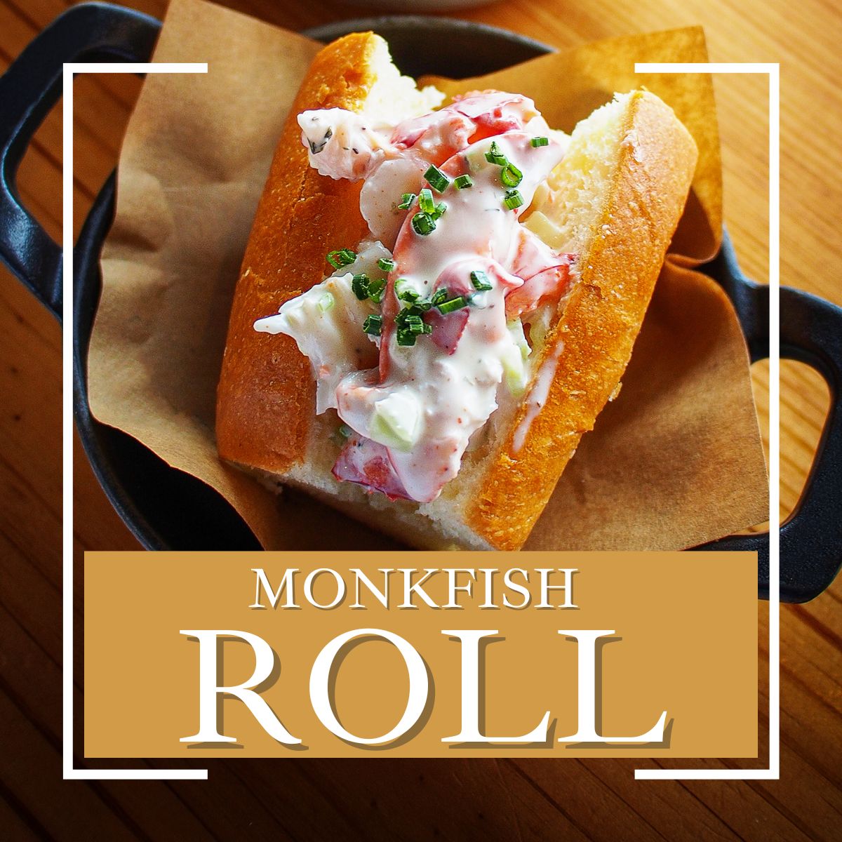 top view of a monkfish lobster roll wrapped with brown paper