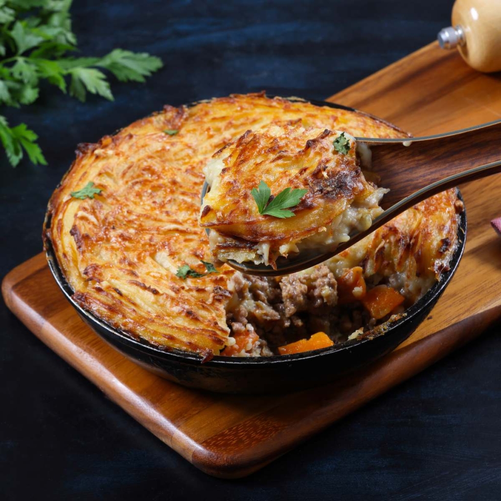 Shepherd's Pie in a pan on serving board placed on the table