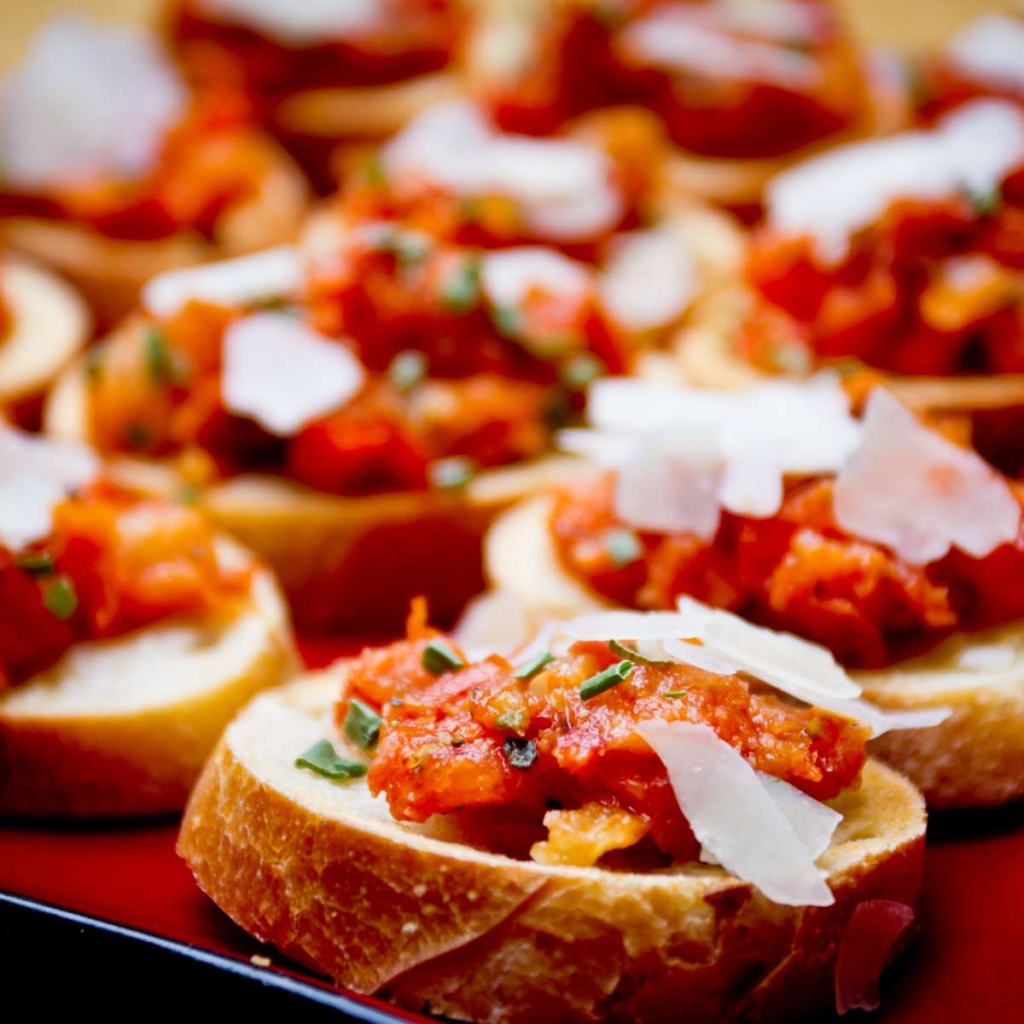 Bread topped with tomato sauce