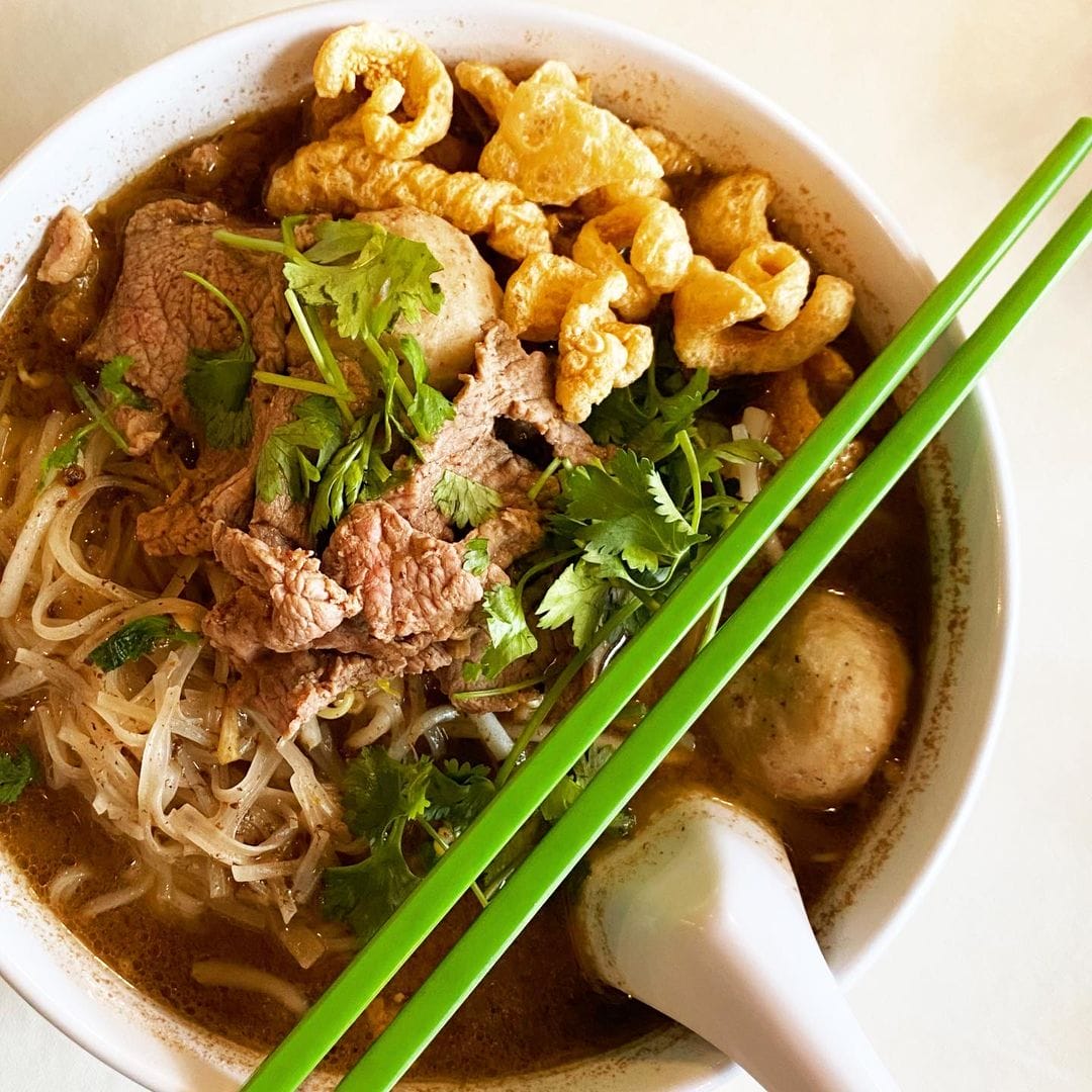 A photo of boat noodle soup by Justin